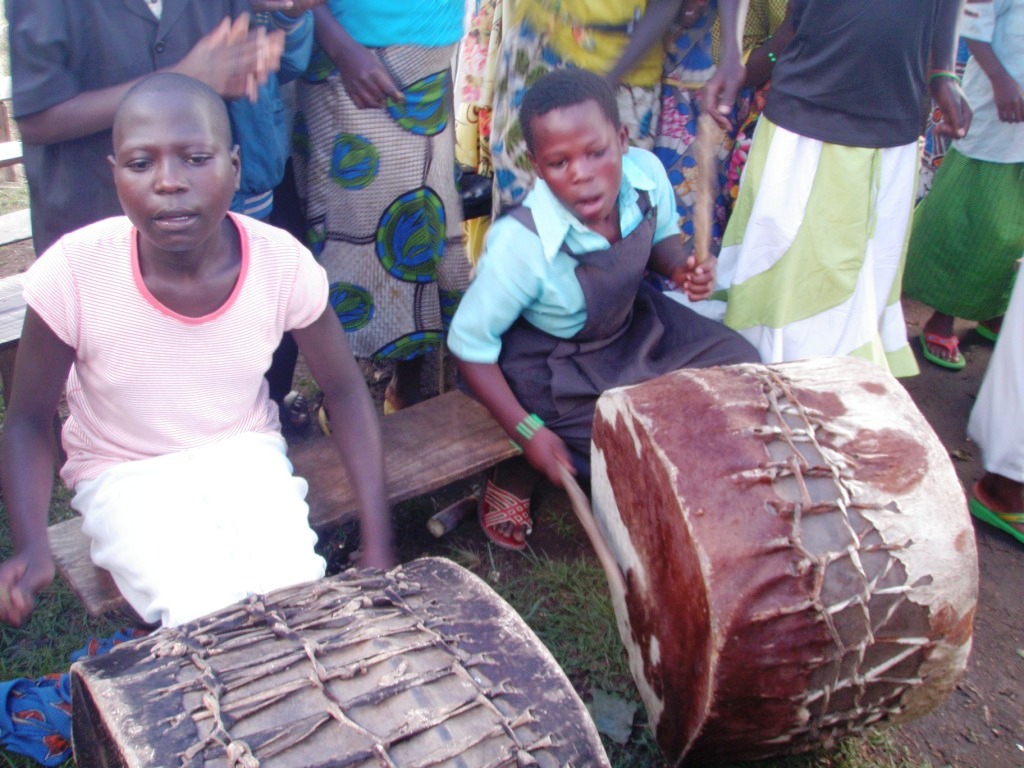 These girls could really play the drums. These drums were metal drums cut in half with cowhide coverings.