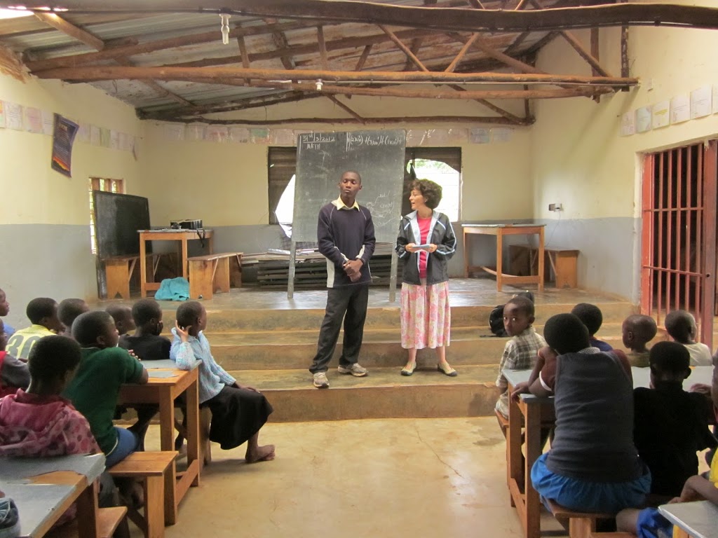 SALLY AND TIMO SHARING WITH THE CHILDREN